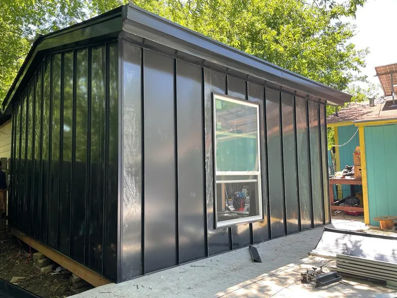 Black standing seam metal wall panels for Roof Inspection in Savoy