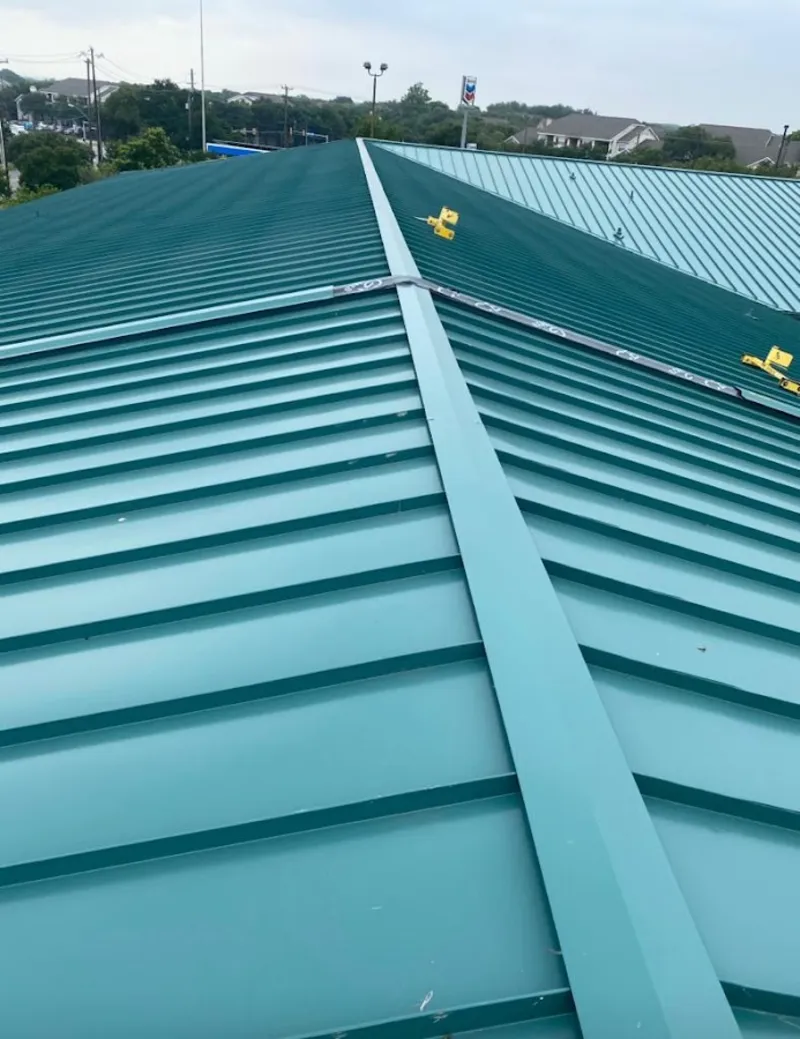 Green commercial metal roof ridge and valley for Metal Roof Repair in Savoy